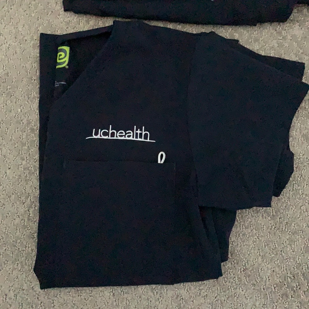 3 UC Health scrub tops